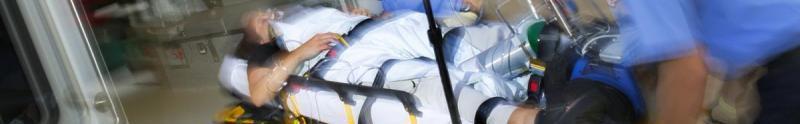 Banner image of an emergency patient on a stretcher.