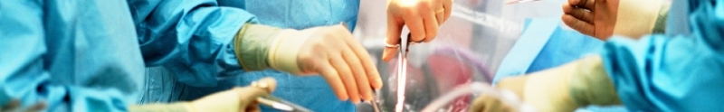 Banner image of doctors in surgery